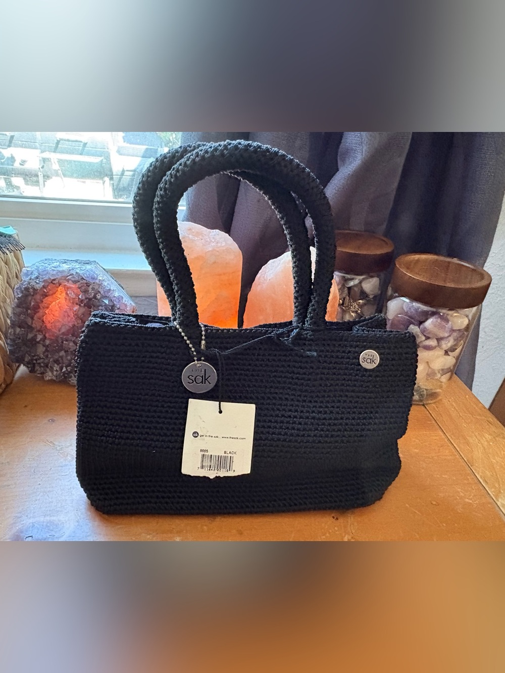 The Sak Black Crochet Tote with Signature Medallions